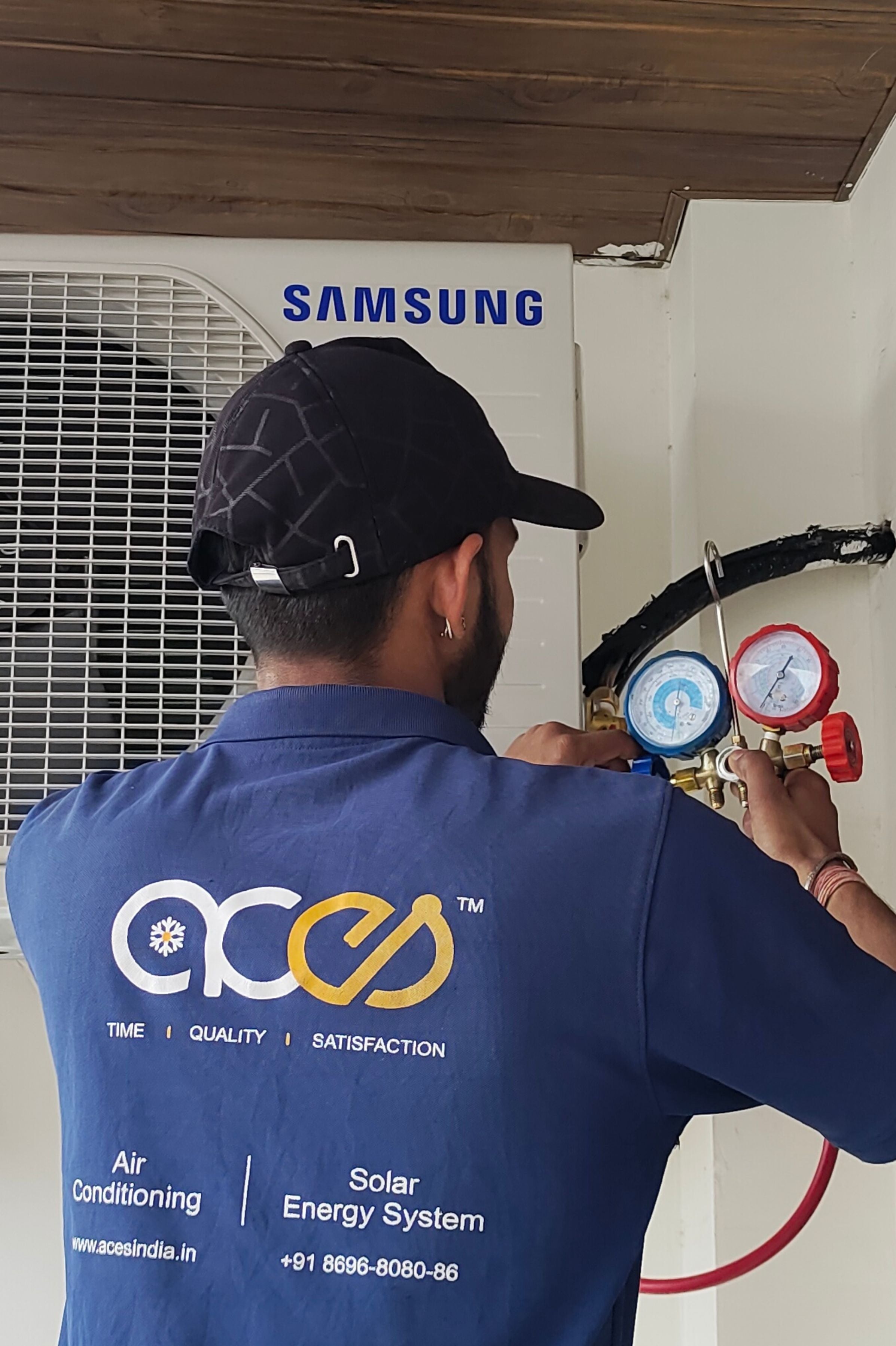 Aces service experts repairing ac outdoor unit